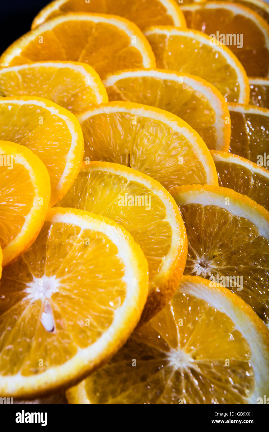 Close up photo of juicy fresh orange slices Stock Photo