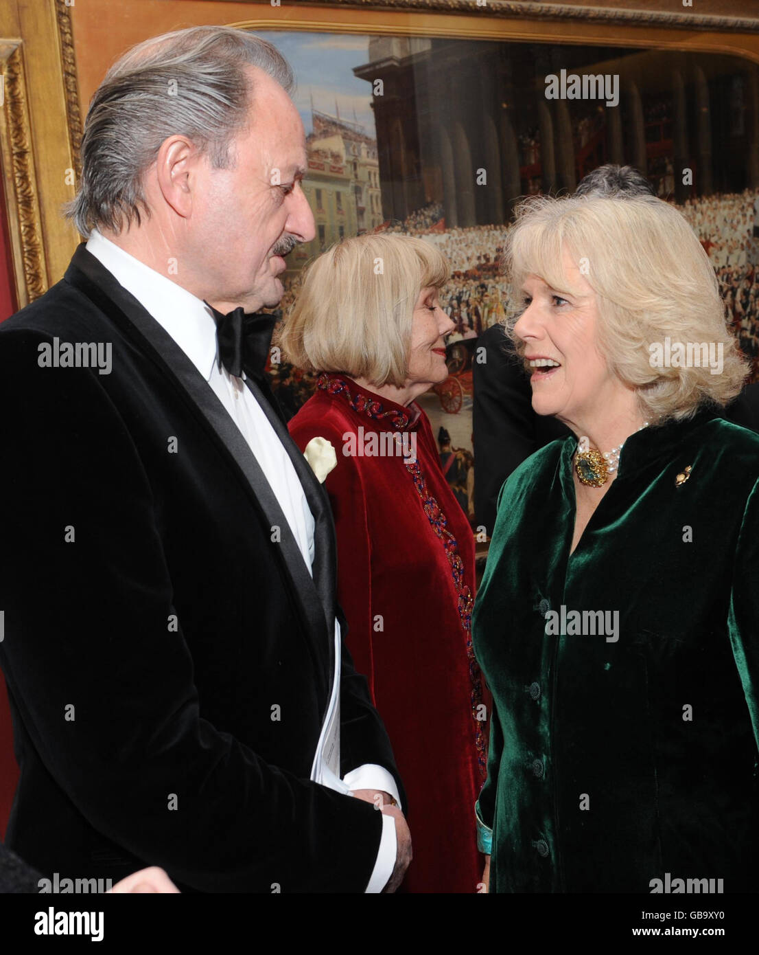 The Duchess of Cornwall meets actor Peter Bowles at the Royal British Legion Christmas celebration at the Guildhall in London. Stock Photo