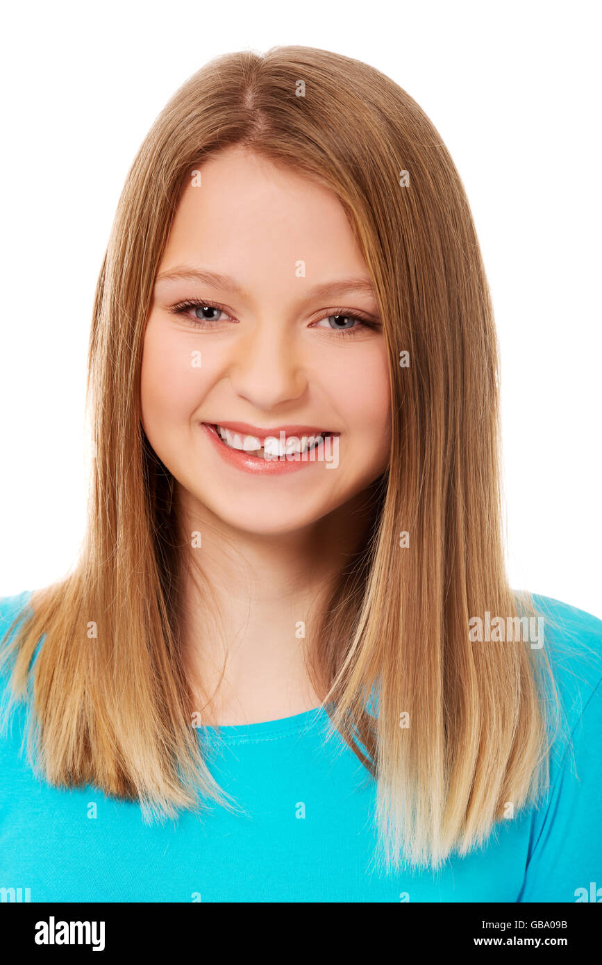 Young woman with toothy smile Stock Photo - Alamy