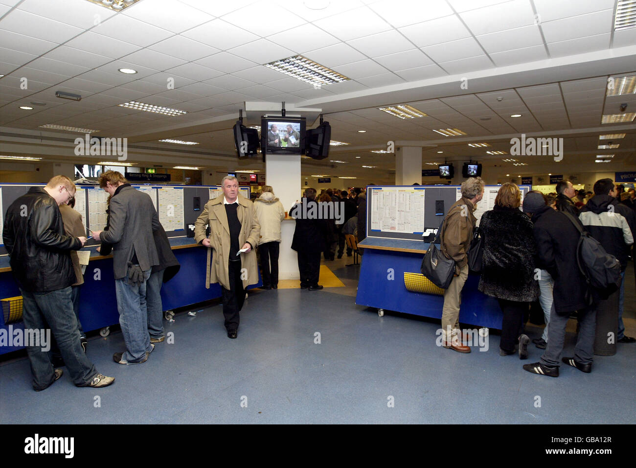 Punters make bets in hospitality area hires stock photography and