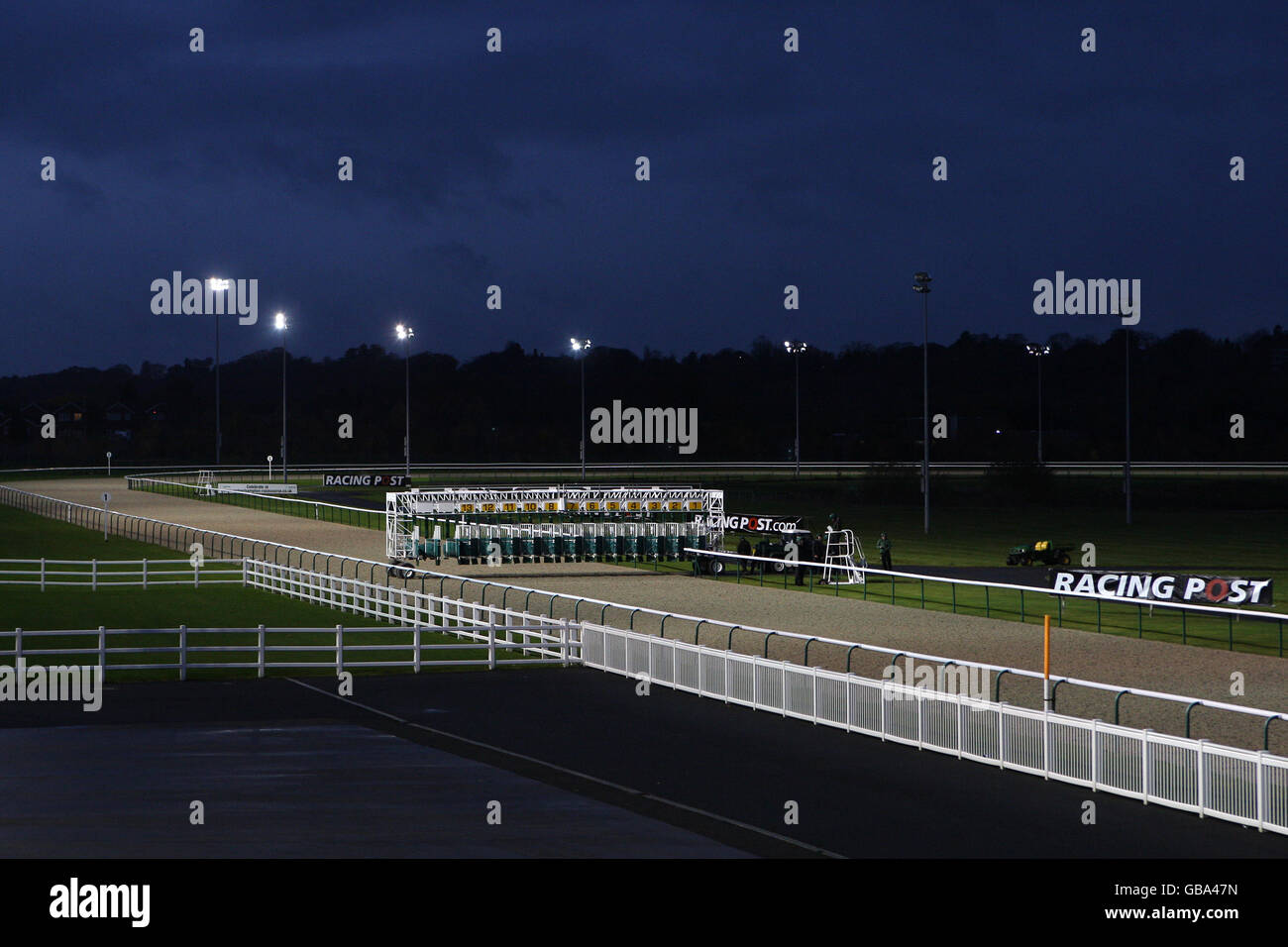 General view of racing at night at wolverhampton racecourse hires