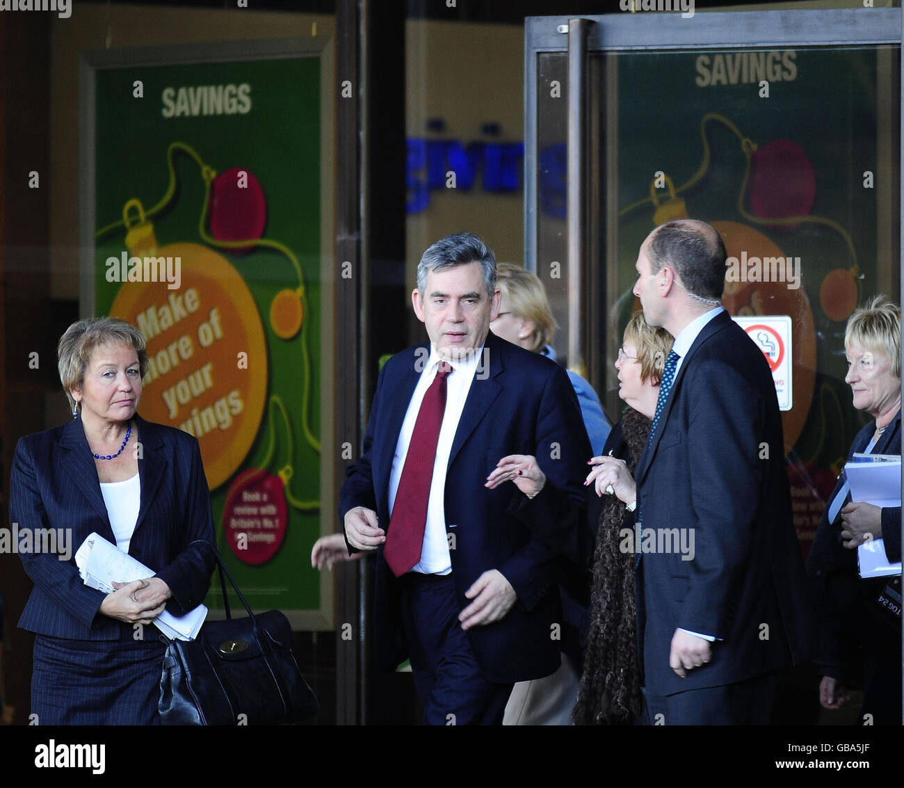 Prime Minister Gordon Brown (centre) arrives at the Royal Armouries Museum in Leeds, where members of the public were able to discuss issues with Cabinet members. Stock Photo