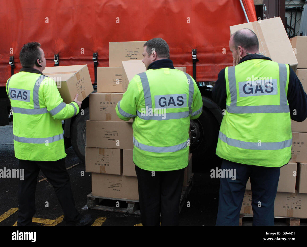 Scottish gas workers hand out fan heaters to locals as gas is cut off in the Kelso area of the Scottish Borders. Stock Photo