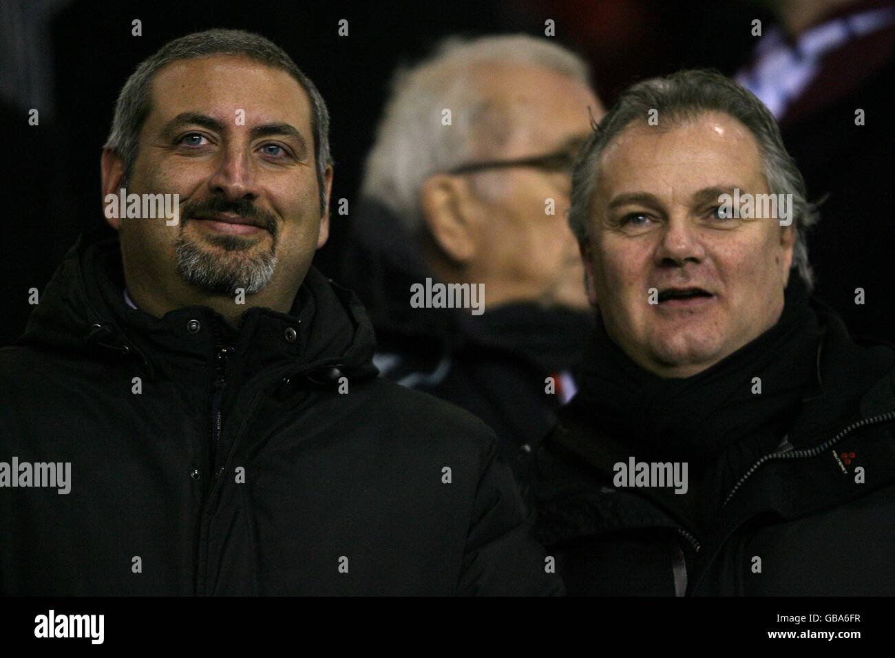 Soccer - Barclays Premier League - Liverpool v West Ham United - Anfield. West Ham United Director of Football Gianluca Nani (r) in the stands Stock Photo