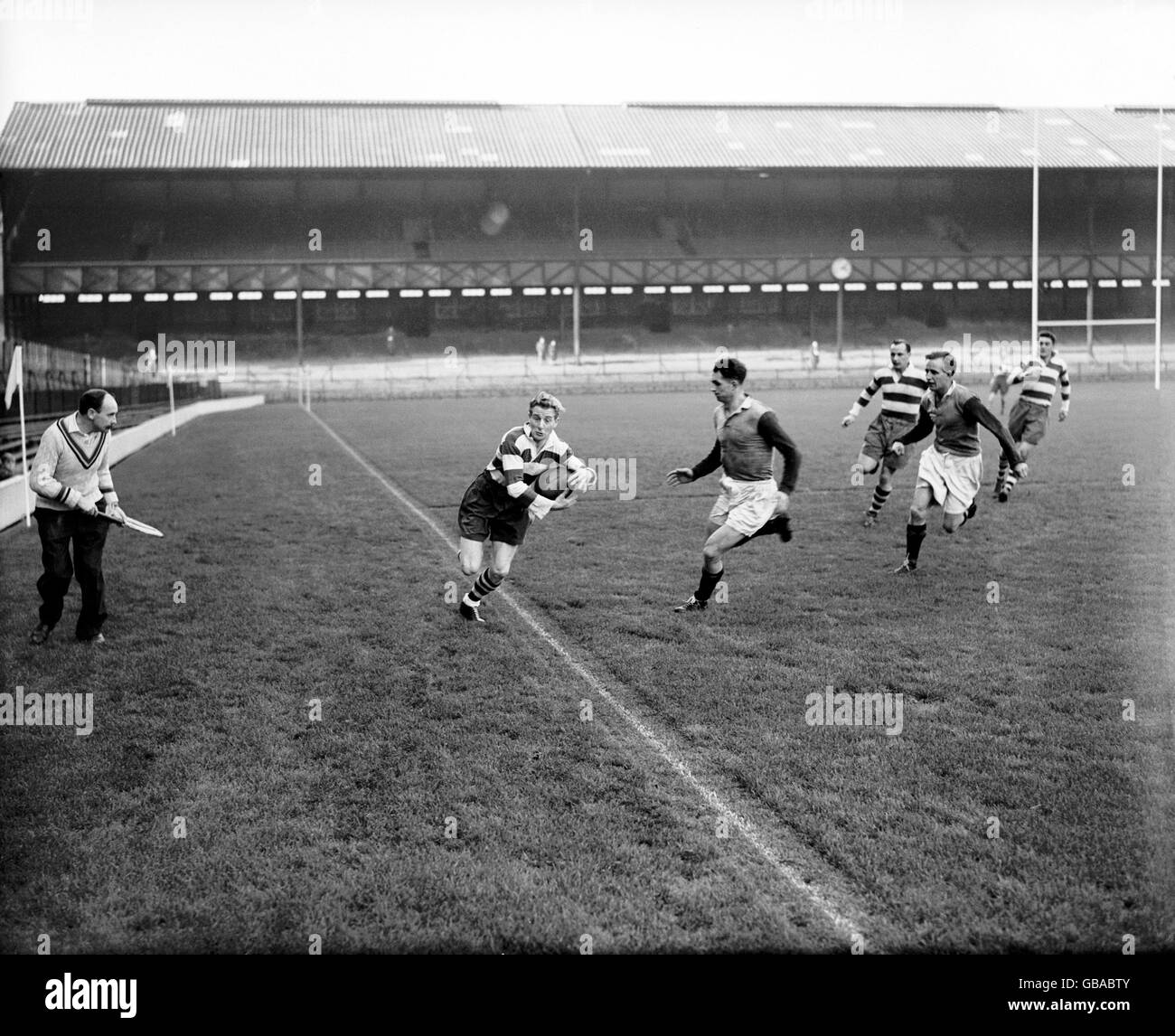 Bristol's Jack Gregory (l) steps into touch as he sprints down the wing