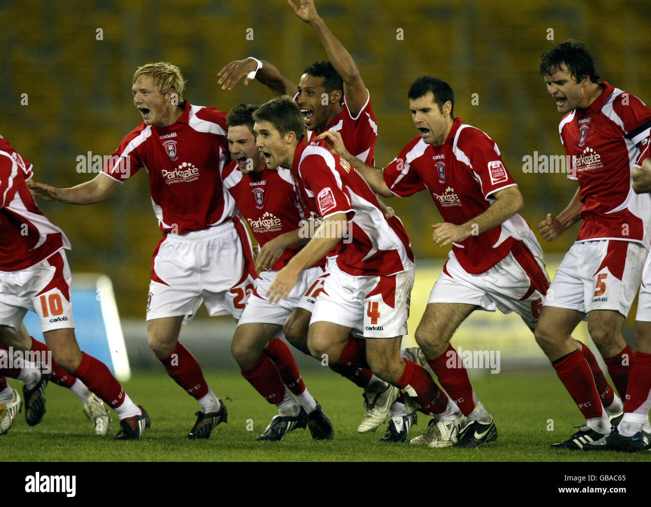 Soccer - Johnstone's Paint Trophy - Northern Section - Rotherham United v Darlington - Don Valley Stadium. Rotherham United's players lead by Danny Harrison (no 4) celebrate their victory in the penalty shoot out Stock Photo