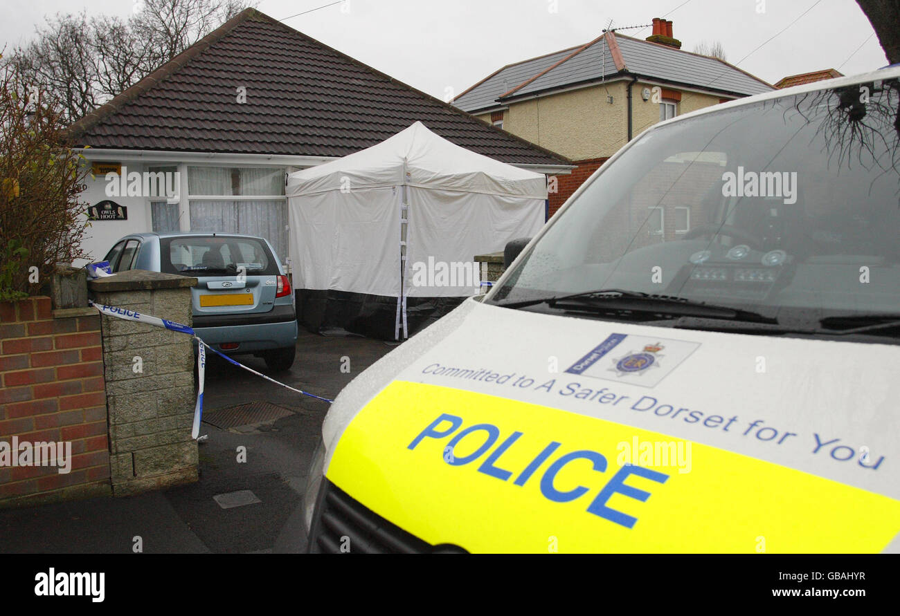 The scene in Uplands Road, Bournemouth, where a woman has been arrested on suspicion of murder after the bodies of two elderly people were found in the bungalow. Stock Photo