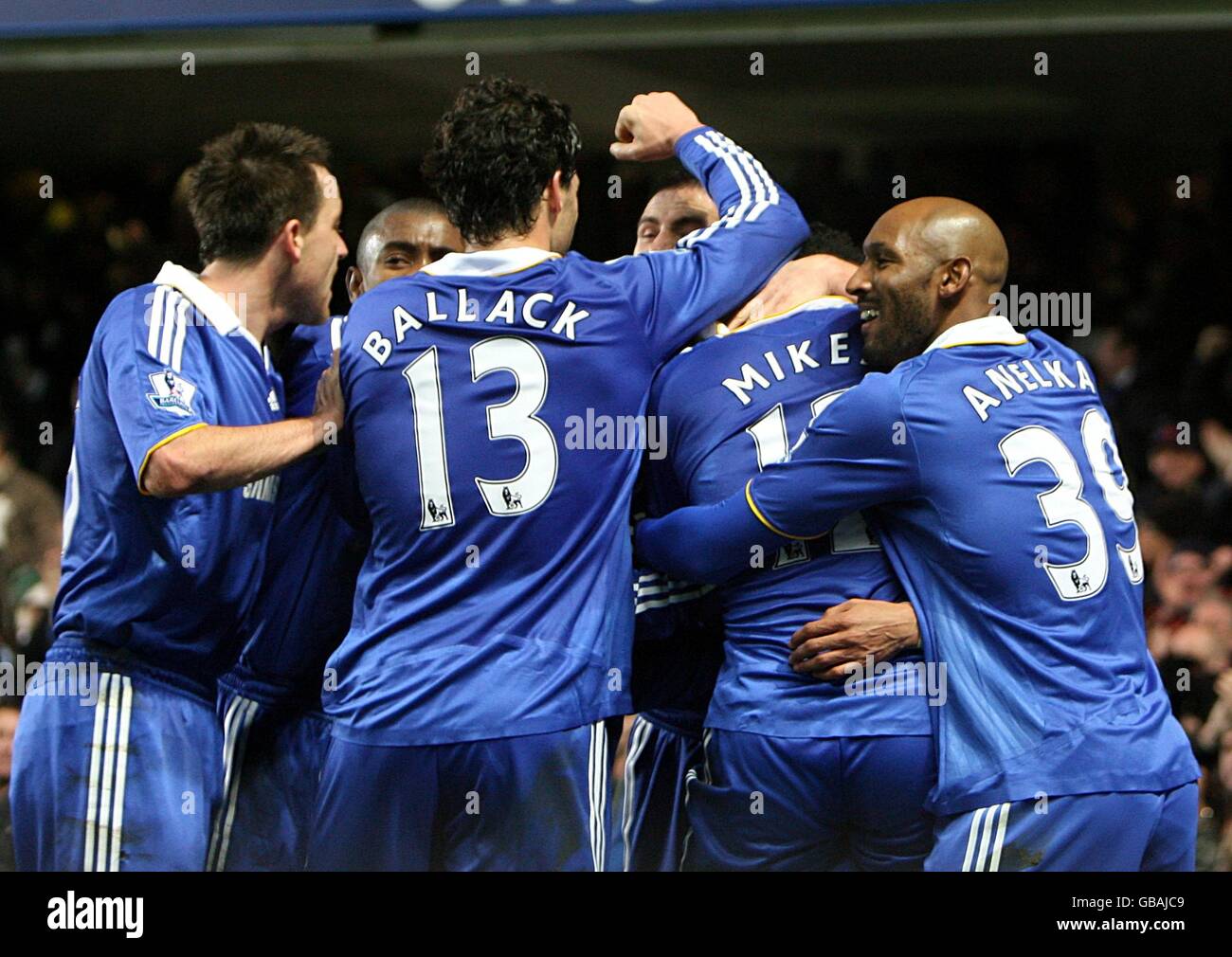Soccer - Barclays Premier League - Chelsea v Arsenal - Stamford Bridge. Chelsea's players celebrate the opening goal of the game, an own goal scored by Arsenal's Johan Djourou Stock Photo