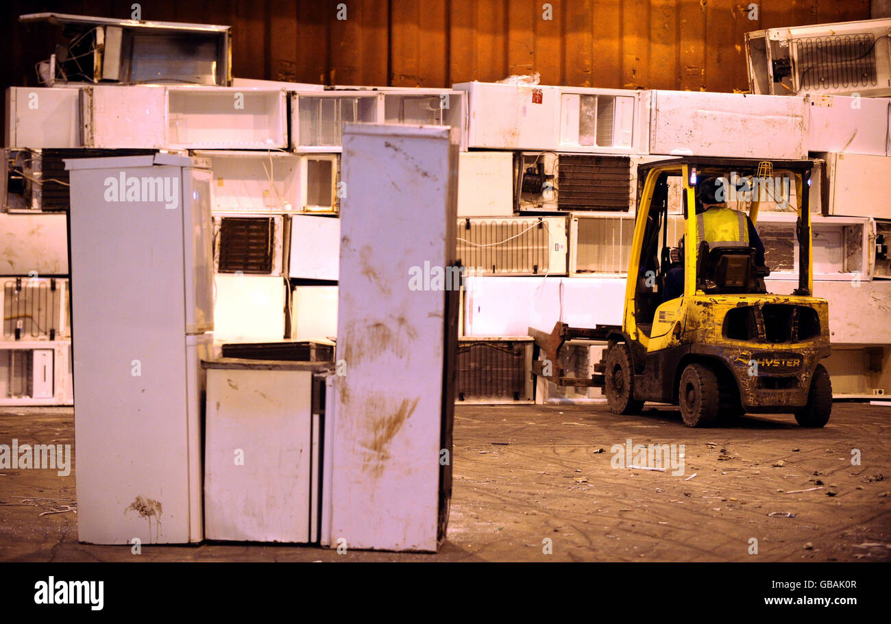 A small forklift at the 10 million Wincanton recycling plant in Billingham, Teeside, where old fridges and washing machines are placed before they are recycled. Stock Photo