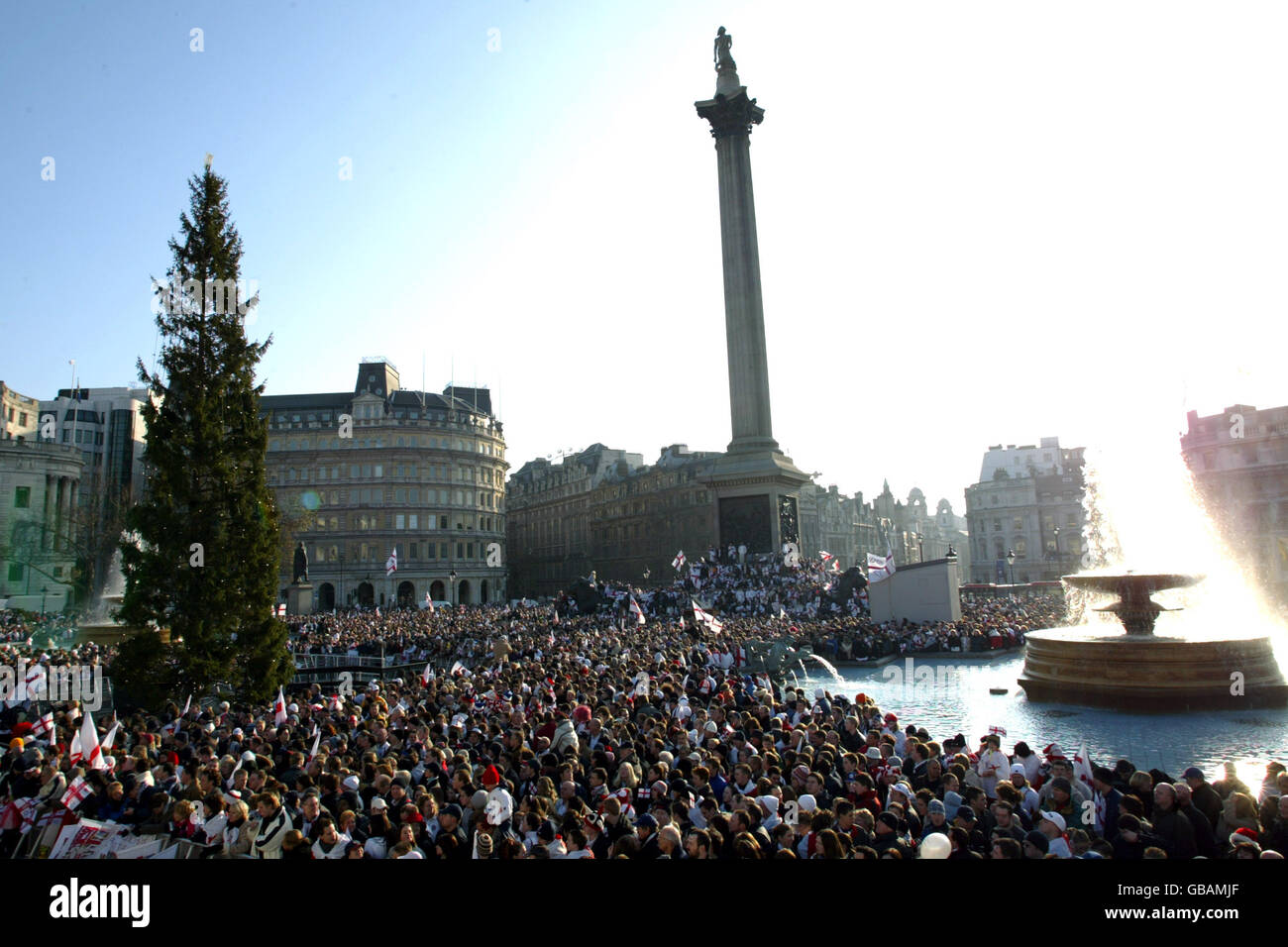 England fans swamp Trafalgar Square in an attempt to catch a glimpse of the England squad Stock Photo