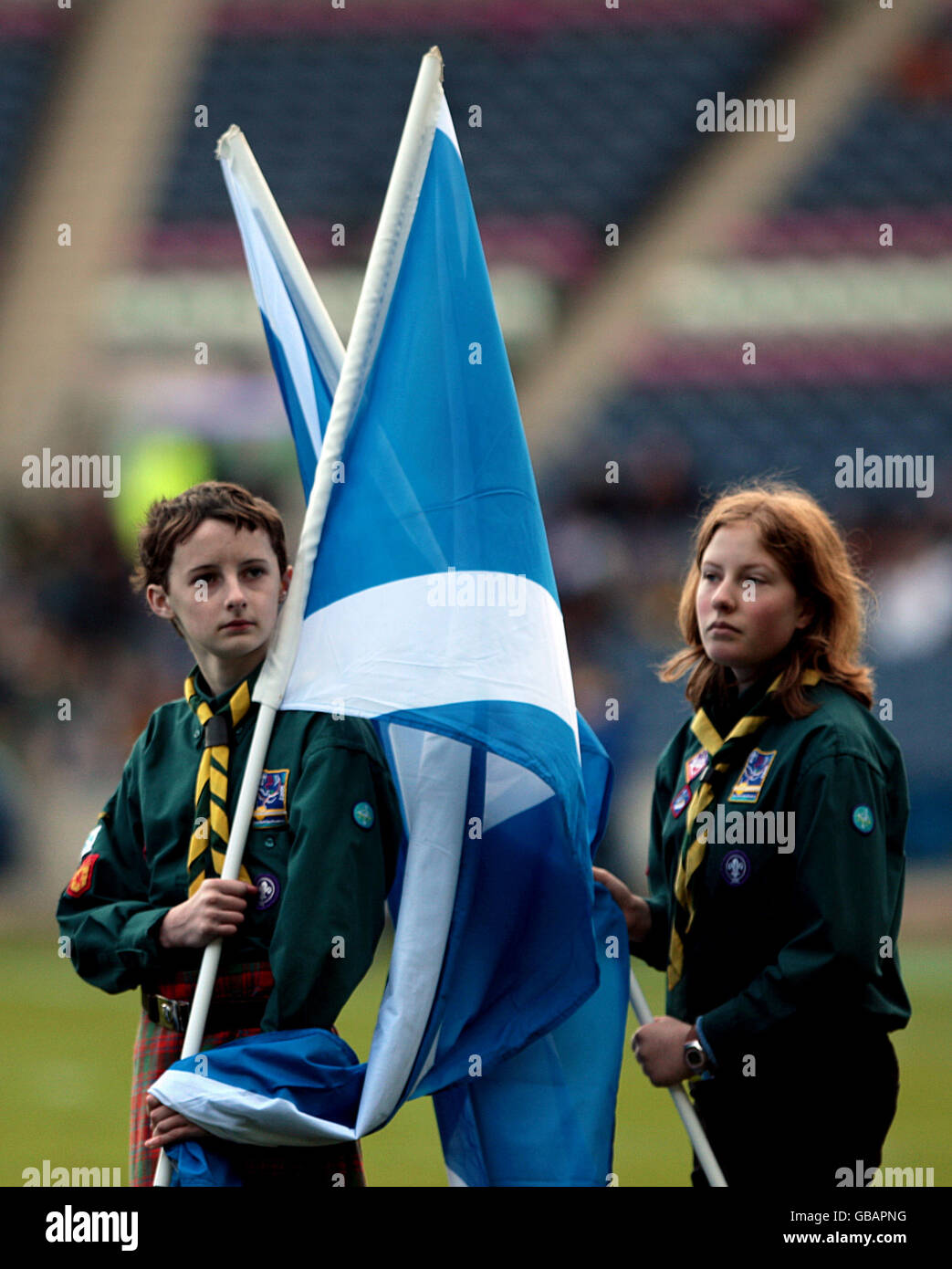 Soltire flags are waved prior to kick off at Murrayfield Stock Photo