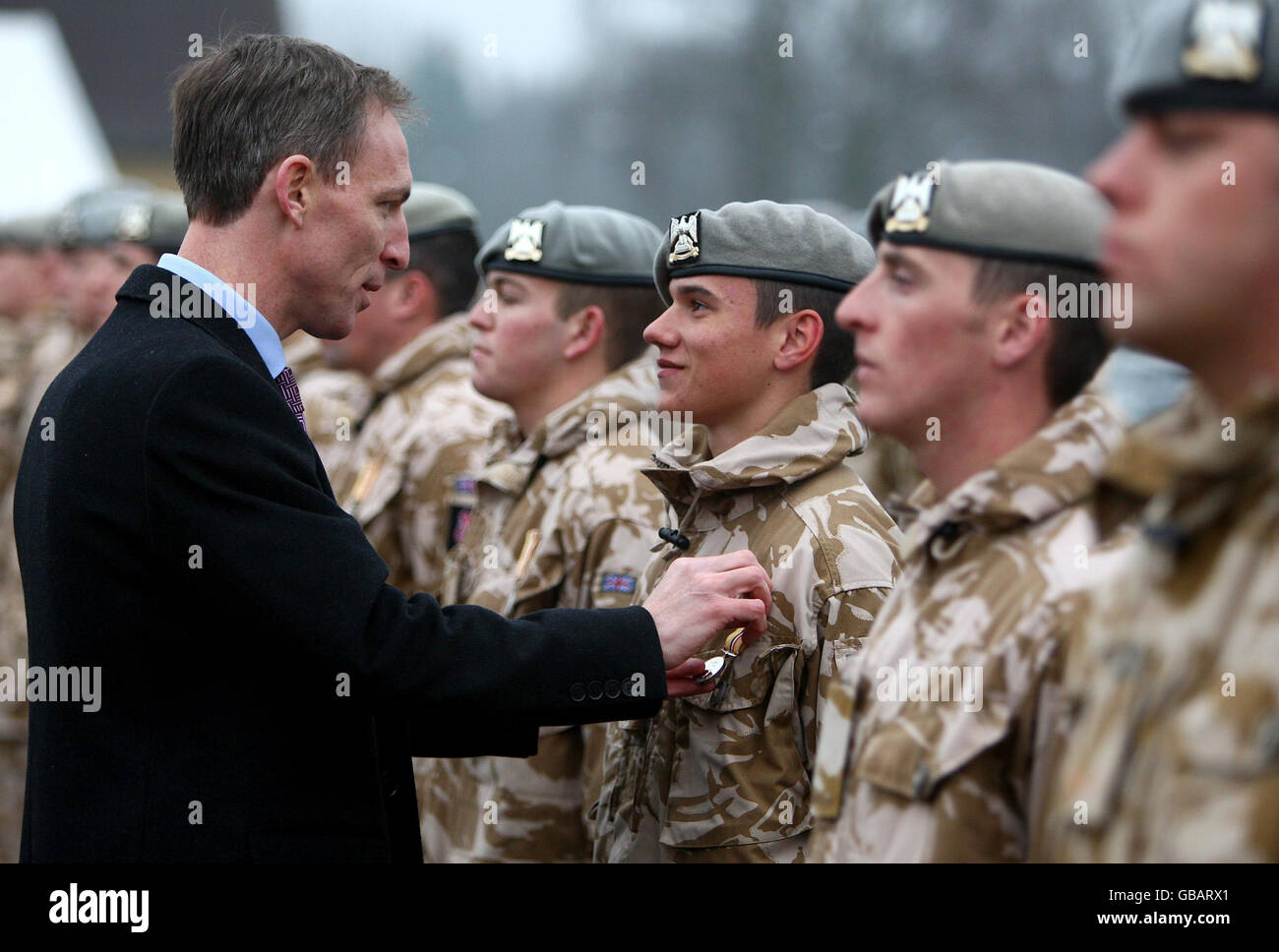 Trooper Grant Halliburton From The Royal Scots Dragoon Guards Receives His  Operational Medal From Secretary Of State For Scotland Jim Murphy, At The  Wessex Barracks In Bad Fallingbostel, Germany Stock Photo -