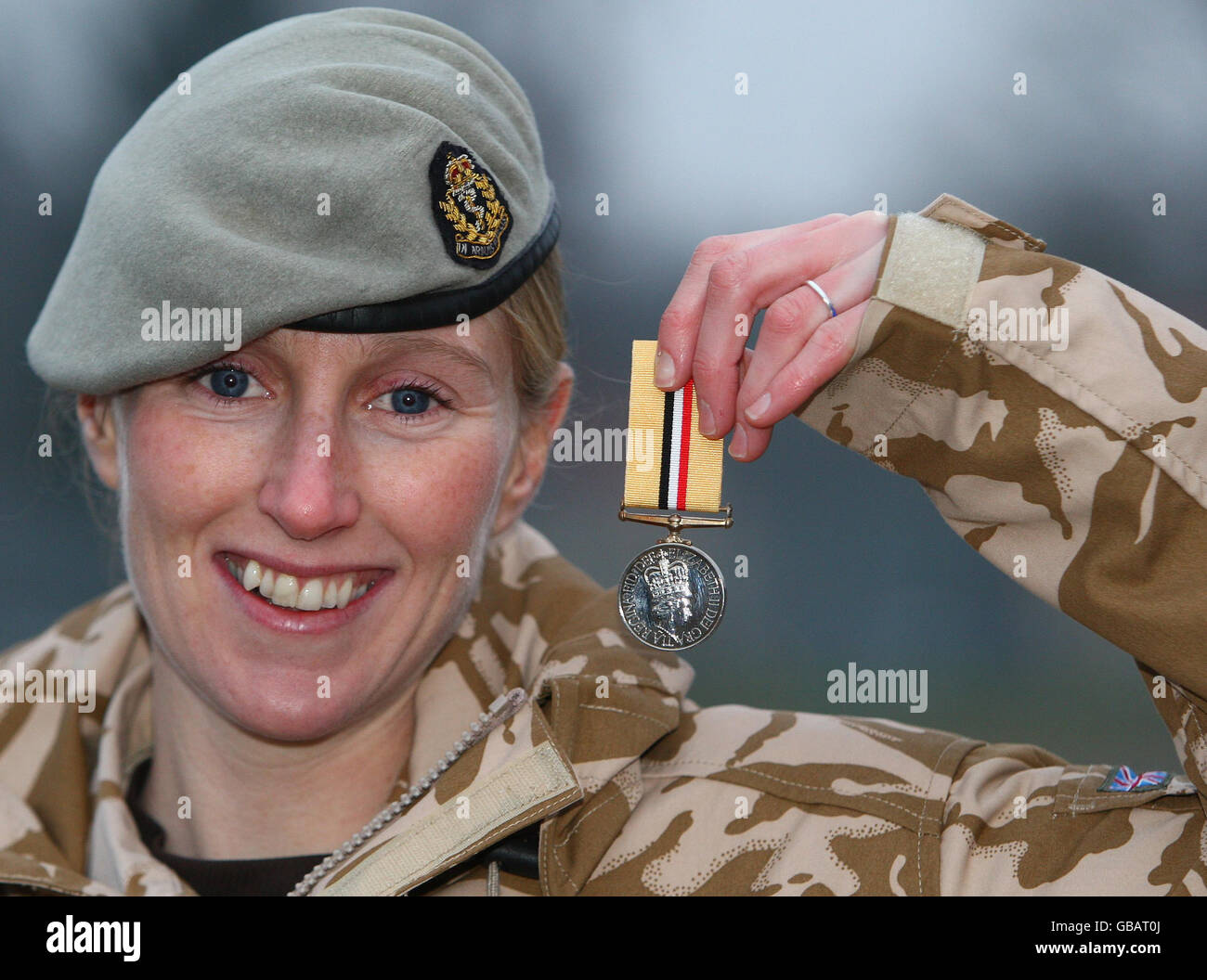 Captain Olivia Berry from the Royal Scots Dragoon Guards, after receiving  her operational medal after her deployment to Iraq, during a ceremony at  Wessex Barracks in Bad Fallingbostel, Germany Stock Photo -