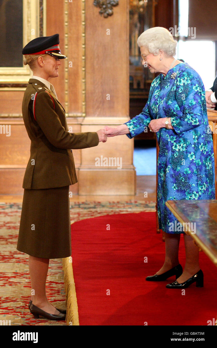 Major Janet Pilgrim, Queen Alexandra's Royal Army Nursing Corps, is made a Member of the Royal Red Cross by The Queen at Windsor Castle. PRESS ASSOCIATION Photo. Picture date: Friday December12, 2008. Photo credit should read: Martin Keene / PA Wire. Stock Photo