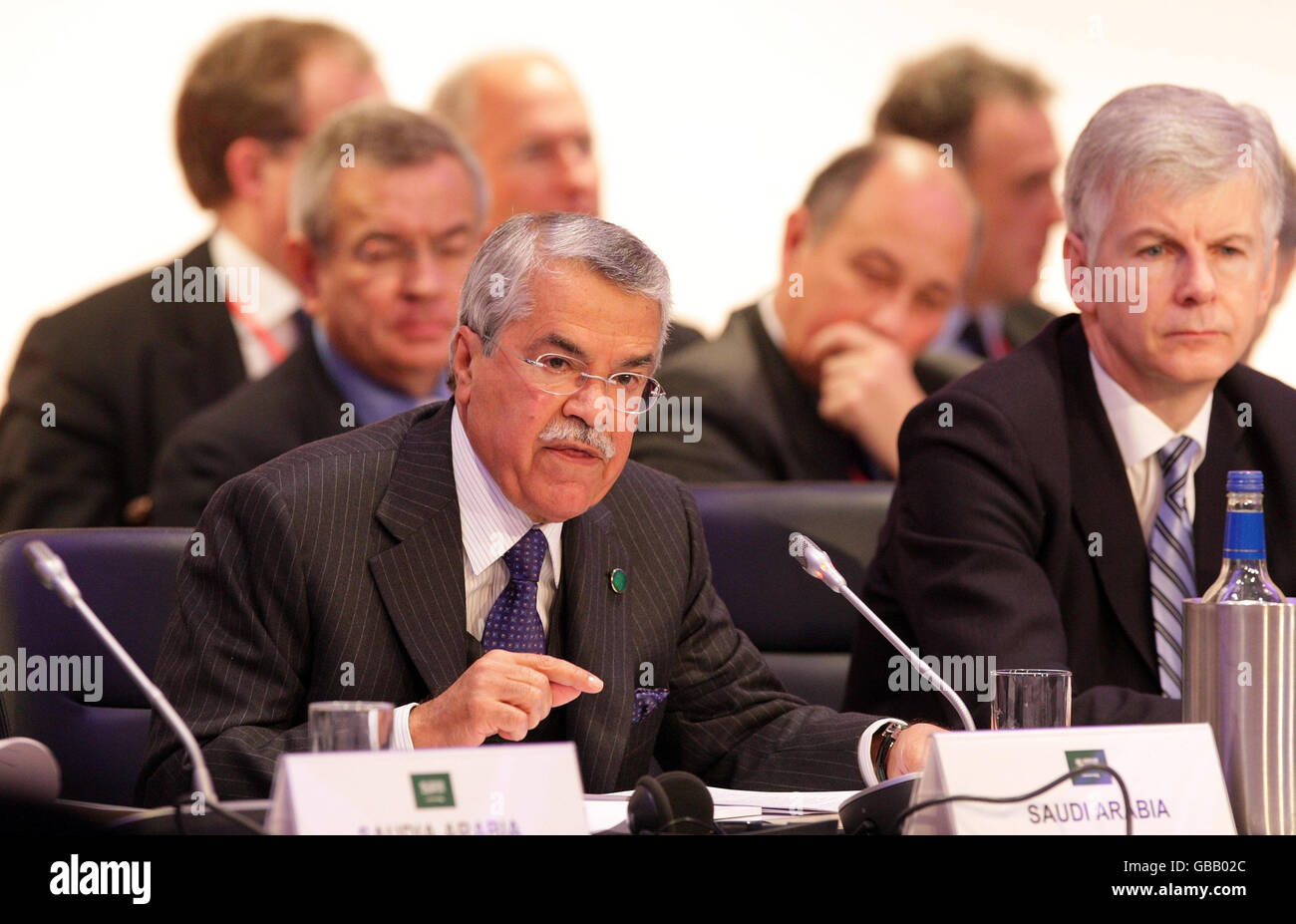 Ali I Naimi (left), the Saudi Arabia Minister of Petroleum and Mineral Resources, speaks at the 'London Energy Meeting' at the Intercontinental Hotel, London, where Prime Minister Gordon Brown delivered a stark warning that failure to tackle volatility in oil prices could cost the global economy trillions of dollars. Stock Photo