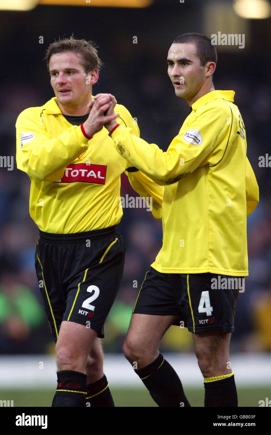 Watford's Captain Neal Ardley (no2) and Paolo Vernazza celebrate at the end of the game after the 2-2 draw with Chelsea Stock Photo