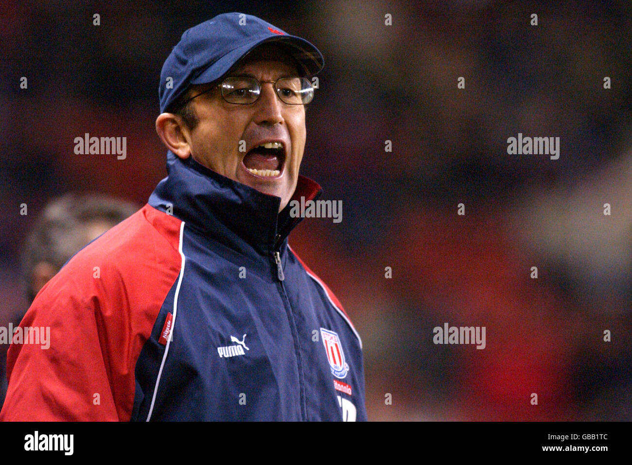 Stoke City Manager Tony Pulis shouts as he sees his team win their second game in four days Stock Photo