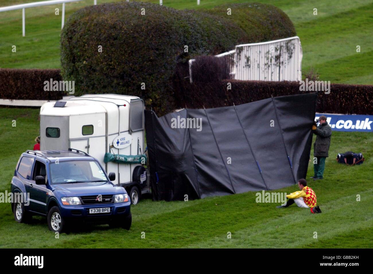 Horse Racing - Sandown - William Hill Tingle Creek Meeting. Jockey RM Power sits dejected after falling from Intelligent Stock Photo