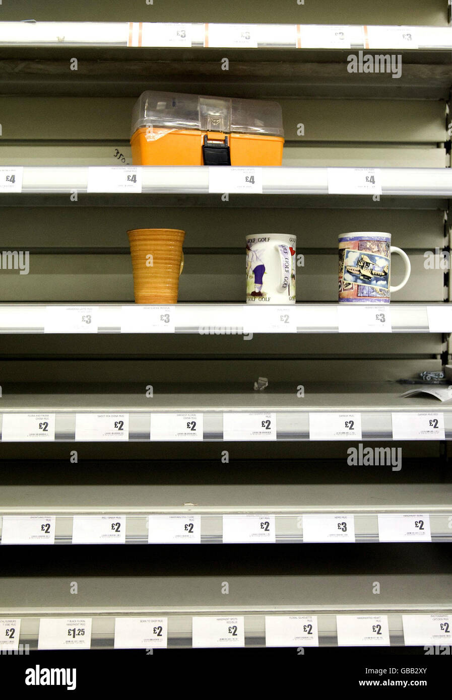 Near empty shelves at a Woolworths store in Camden, London, as the