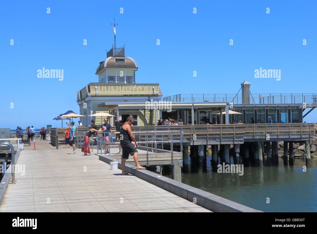 People visit St Kilda beach pier in Melbourne Australia Stock Photo - Alamy