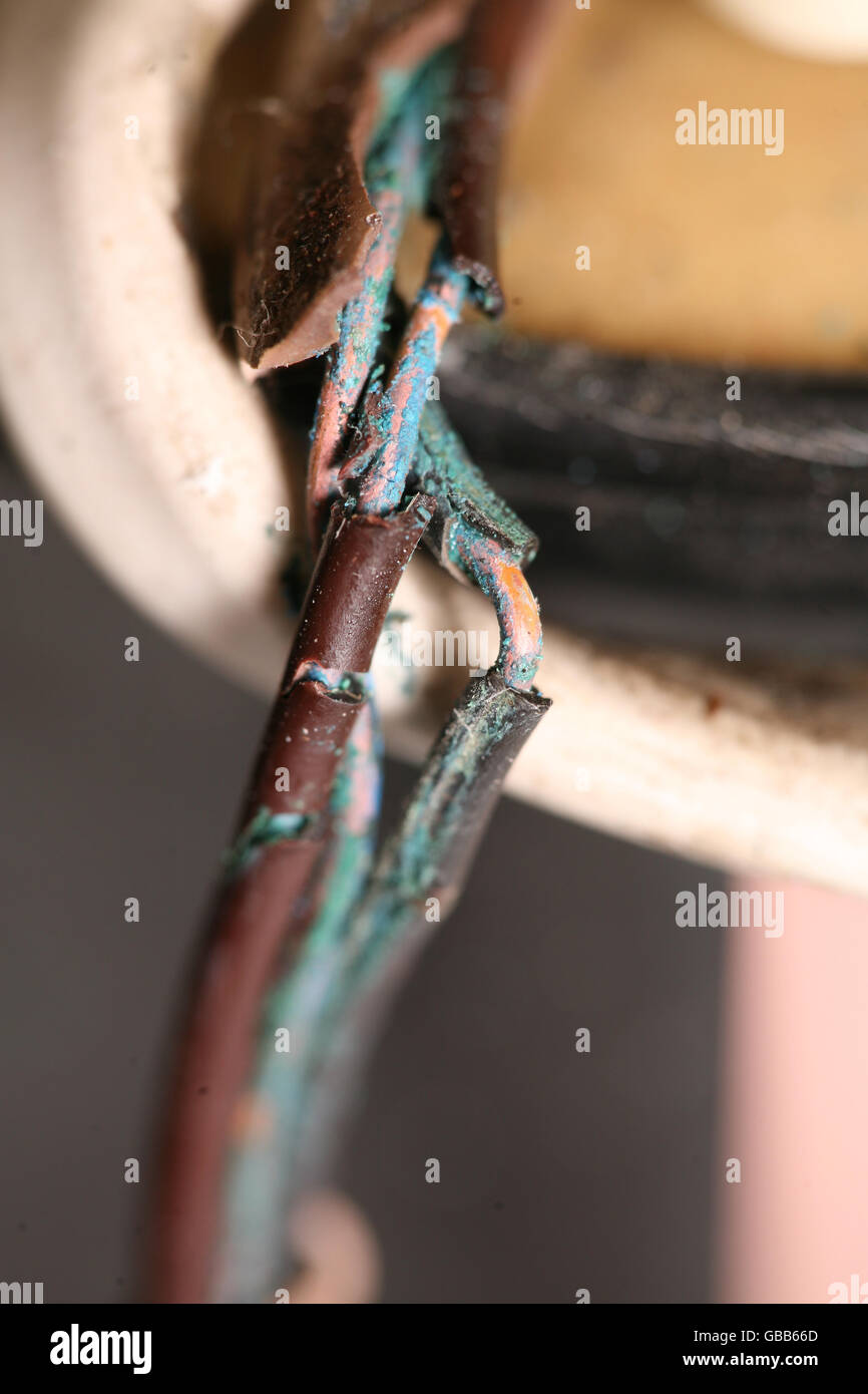 Defective electrical wiring in a house in SW London. Stock Photo