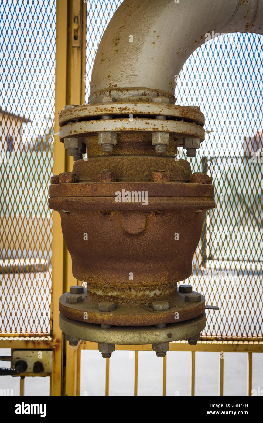 Industrial pipelines joint with rust bolts and joints Stock Photo