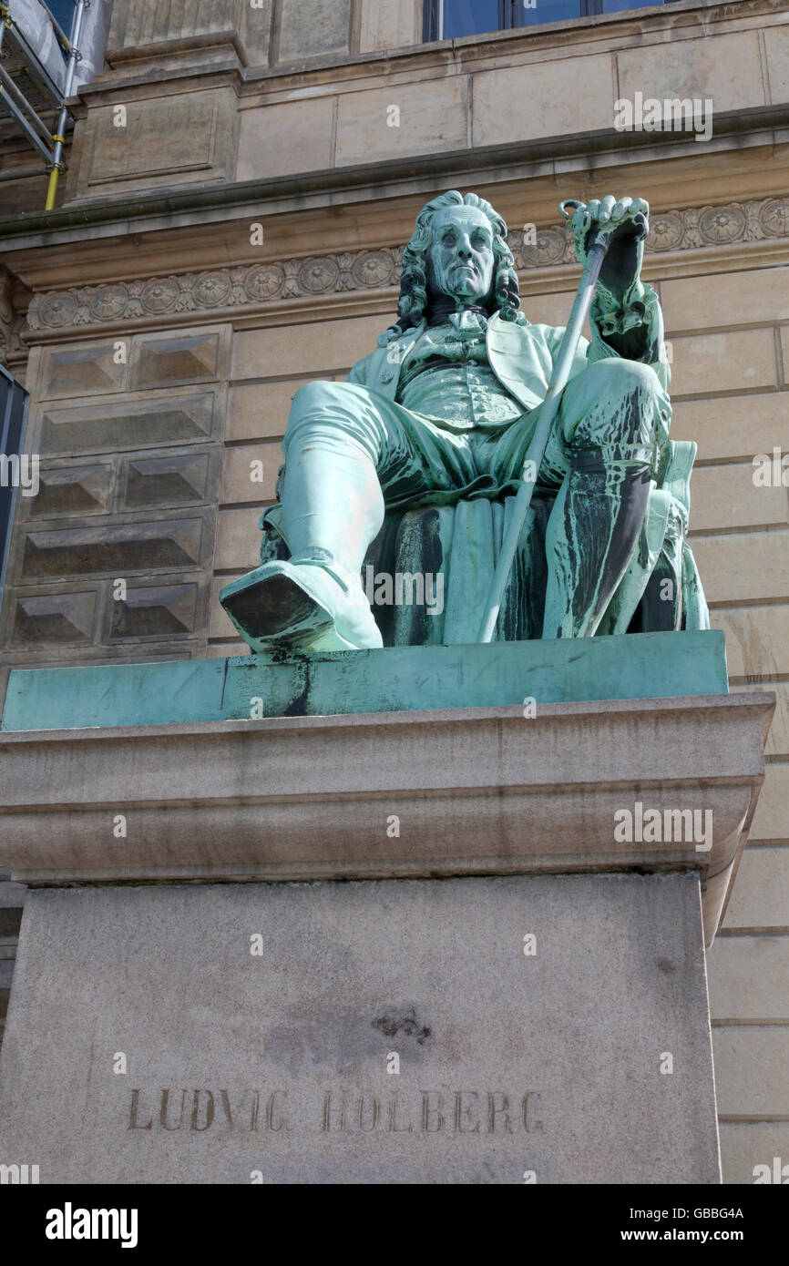 The statue of the Danish / Norwegian writer Ludvig Holberg 1684–1754 outside the Royal Theatre at Kongens Nytorv in Copenhagen Stock Photo