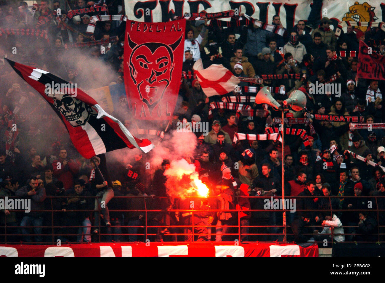 AC Milan fans soak up the atmosphere the game Stock Photo - Alamy