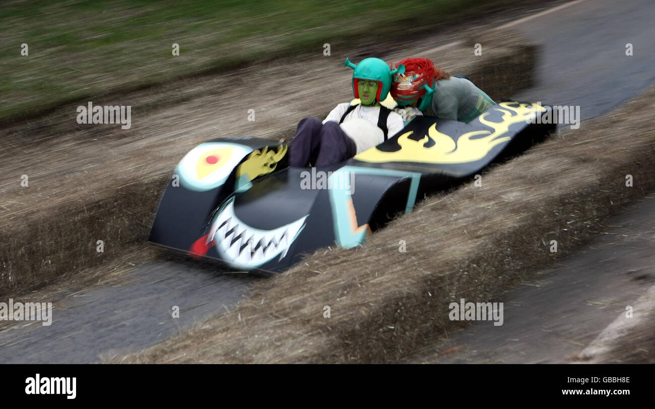 The crew of 'Wrecked 'em racing' negotiate the chicane at the Hoar Cross Downhill soapbox competition. The competition organised by the 'Mad Club' in aid of charity, is run over a 1.25 mile course near the Staffordshire village and last year raised 78,000. Stock Photo