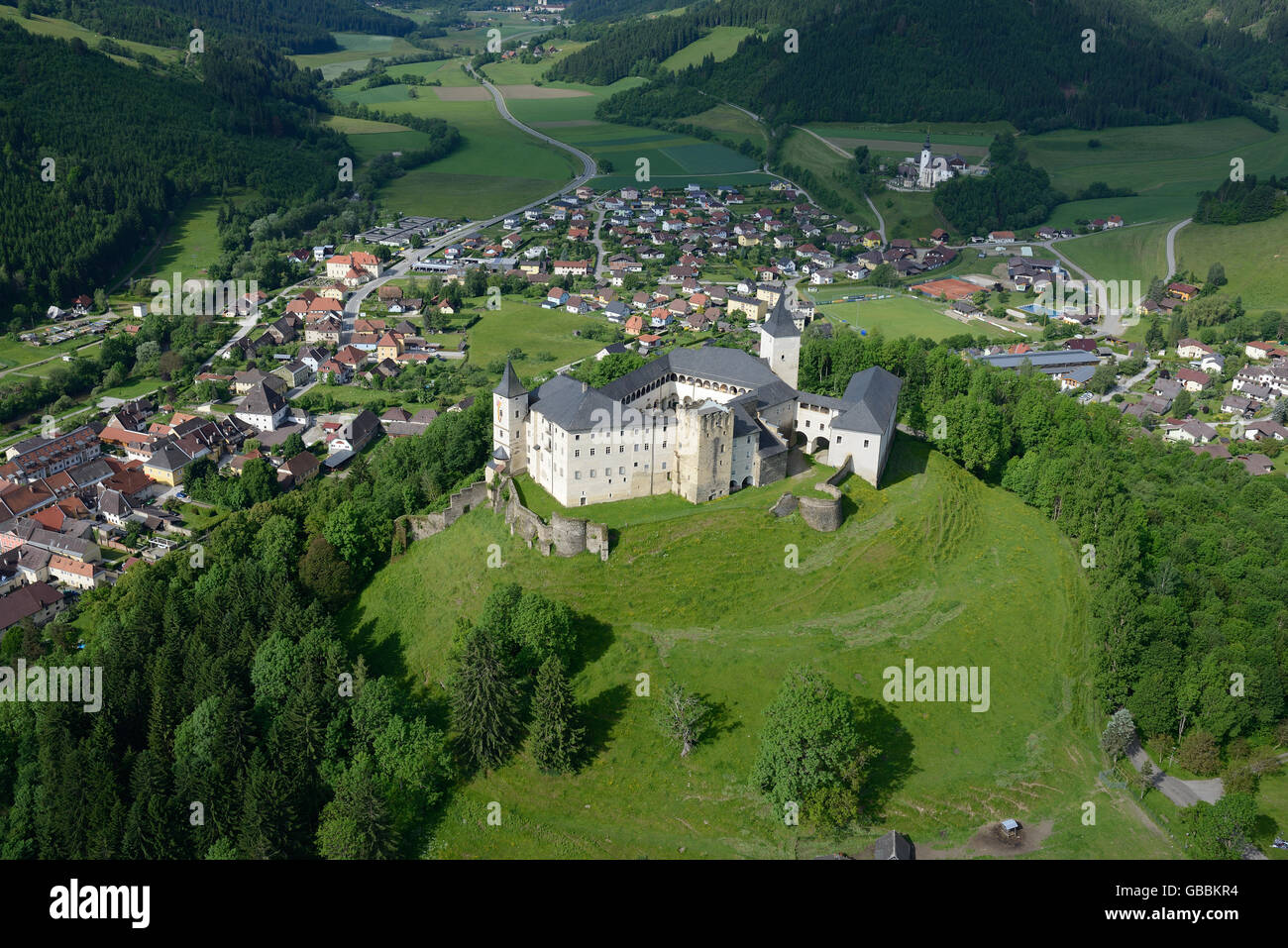 AERIAL VIEW. Straßburg Castle overlooking the town of the same name in the Gurk Valley. District of Sankt Veit an der Glan, Carinthia, Austria. Stock Photo