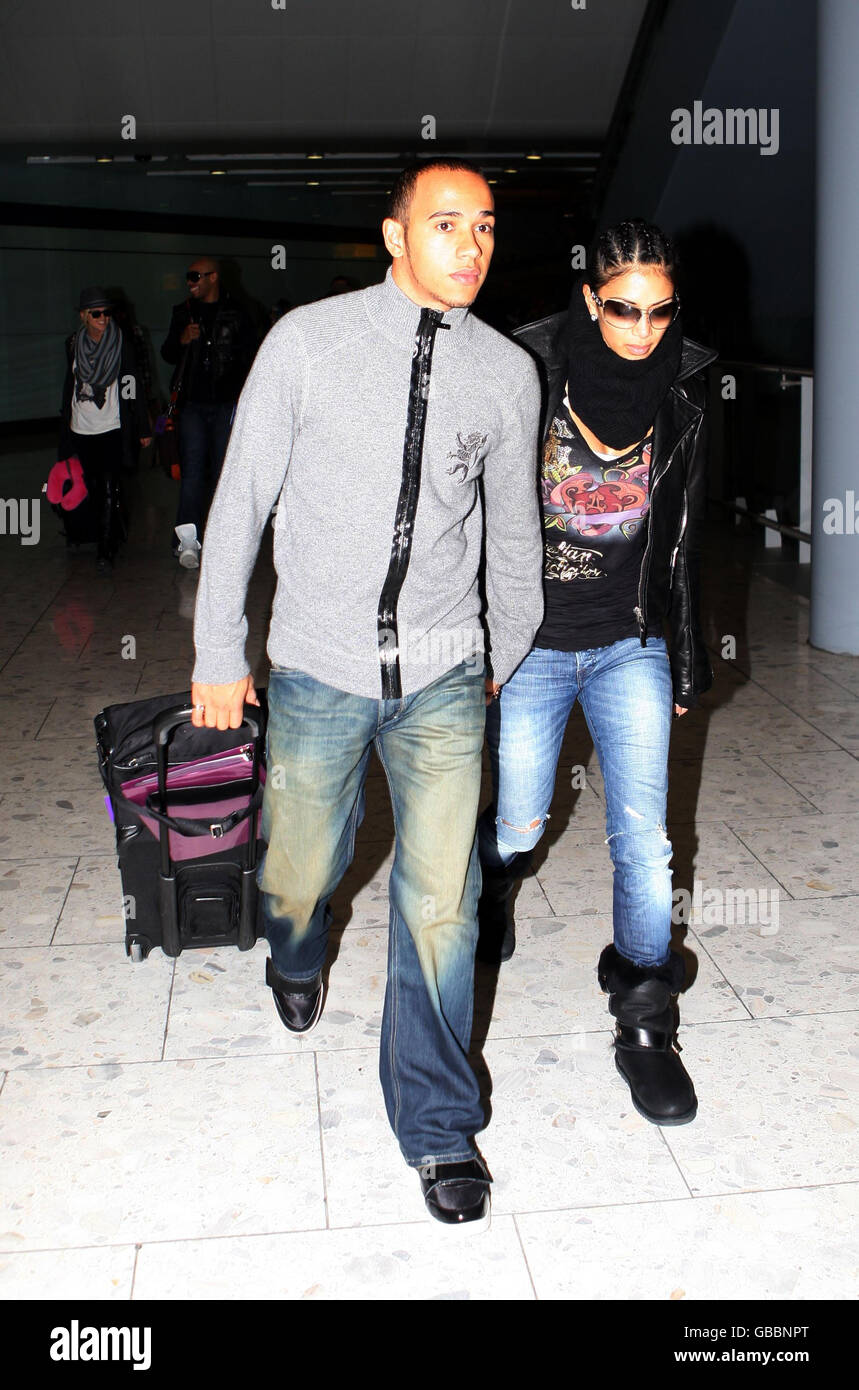 Lewis Hamilton and Nicole Scherzinger arrive at Heathrow Airport Stock Photo