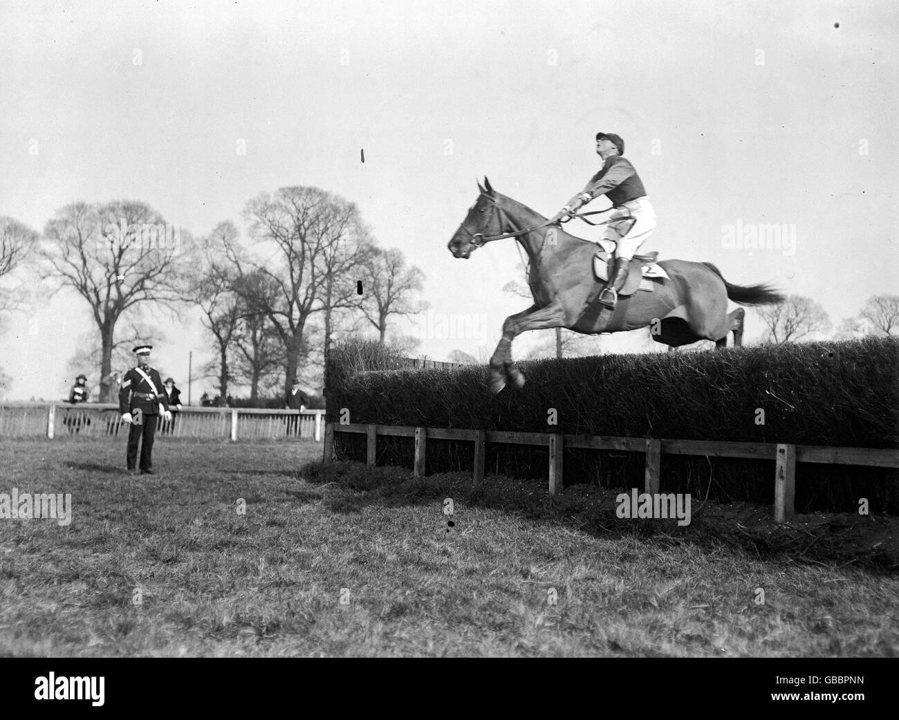 The Prince of Wales clears the Open Ditch in fine style during his first ride under National Hunt rules. Stock Photo