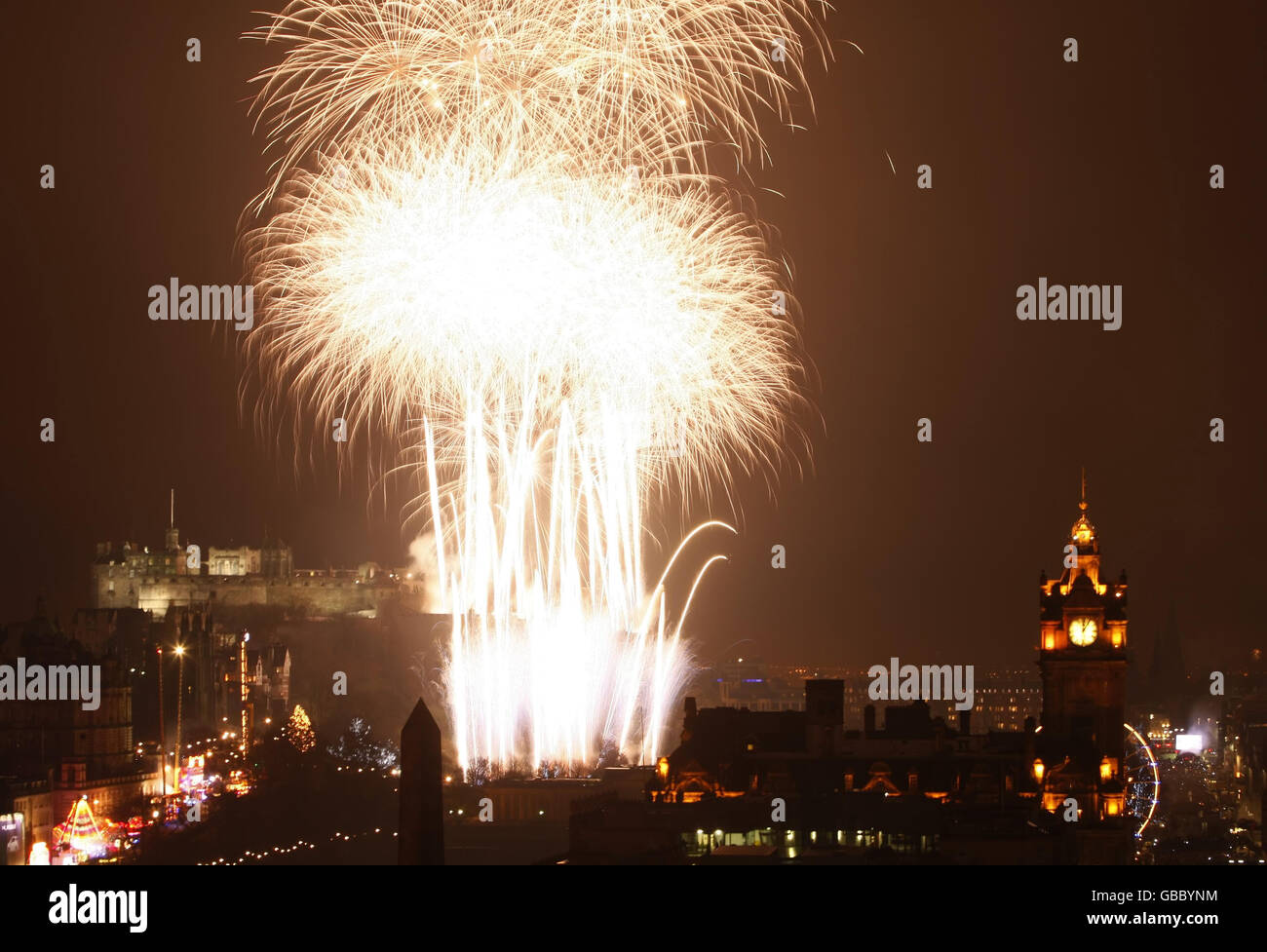 Fireworks mark the new year in Edinburgh, Scotland's capital city Stock