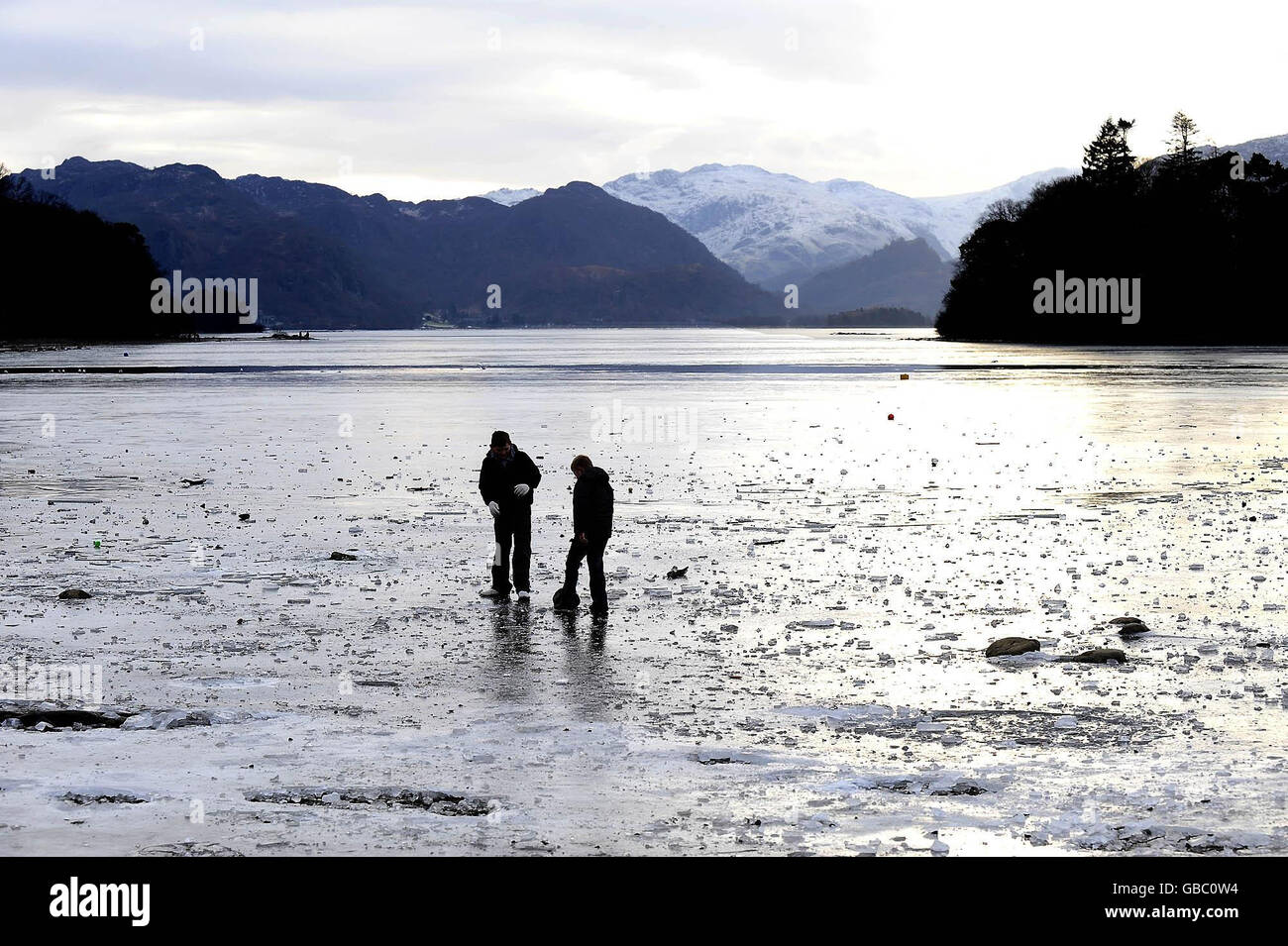 Derwentwater near Keswick frozen solid as the cold spell continues. Stock Photo