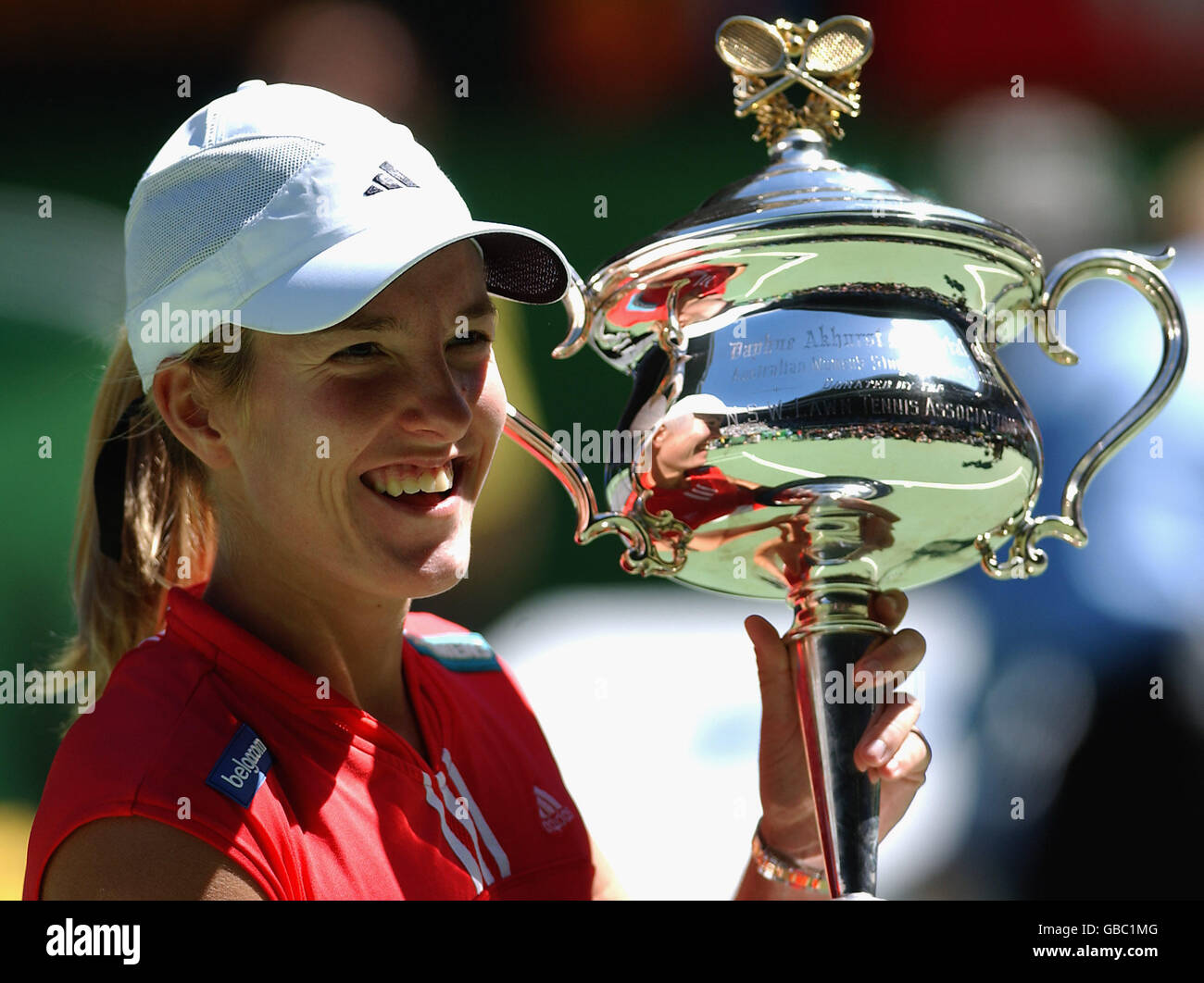 Justine henin hardenne of belgium with womens australian open trophy hi