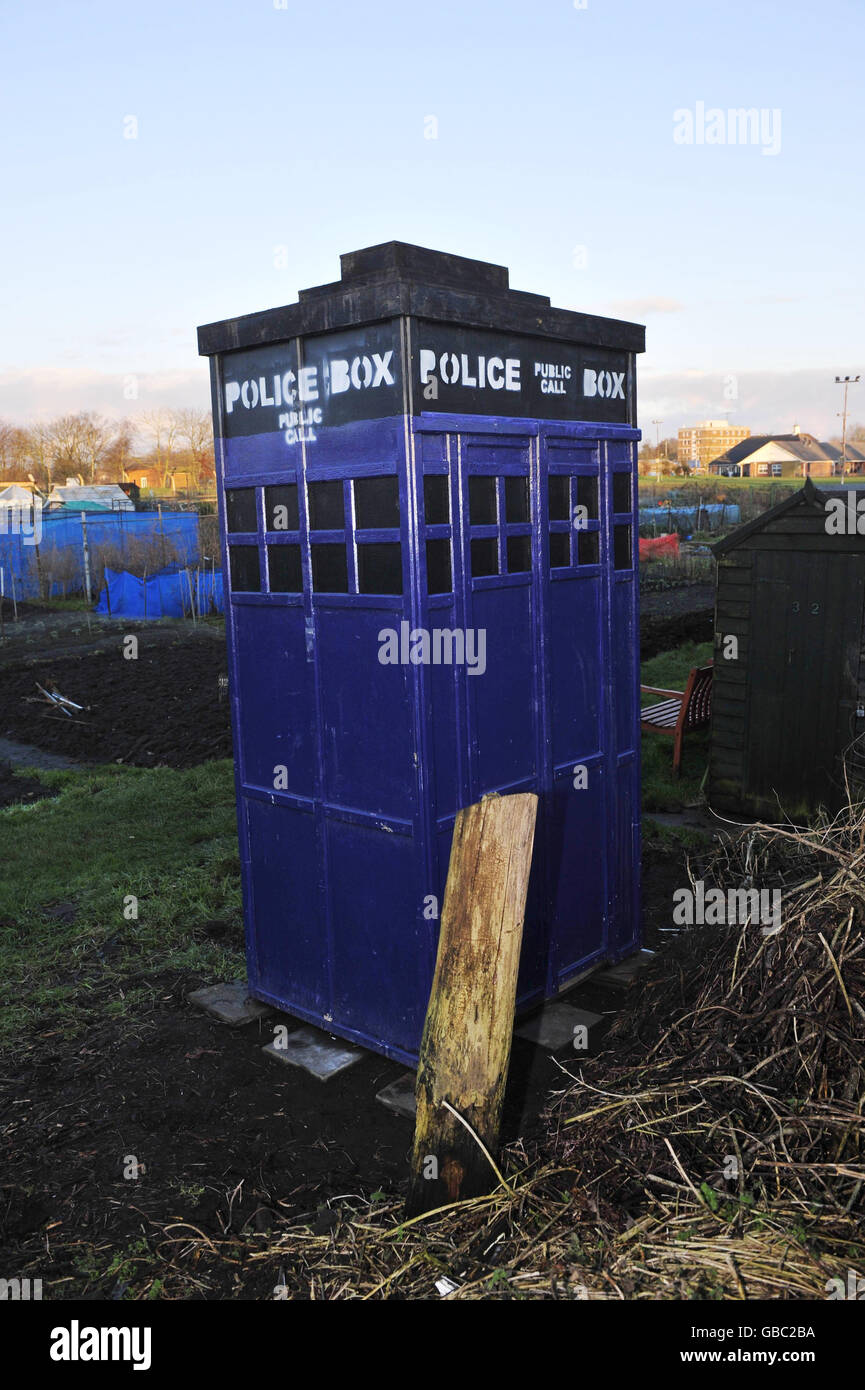A shed shaped like a TARDIS in an allotment on Quakers Walk allotments, Devizes, Wiltshire belonging to Philippa Morgan and Declan McSweeney. Stock Photo