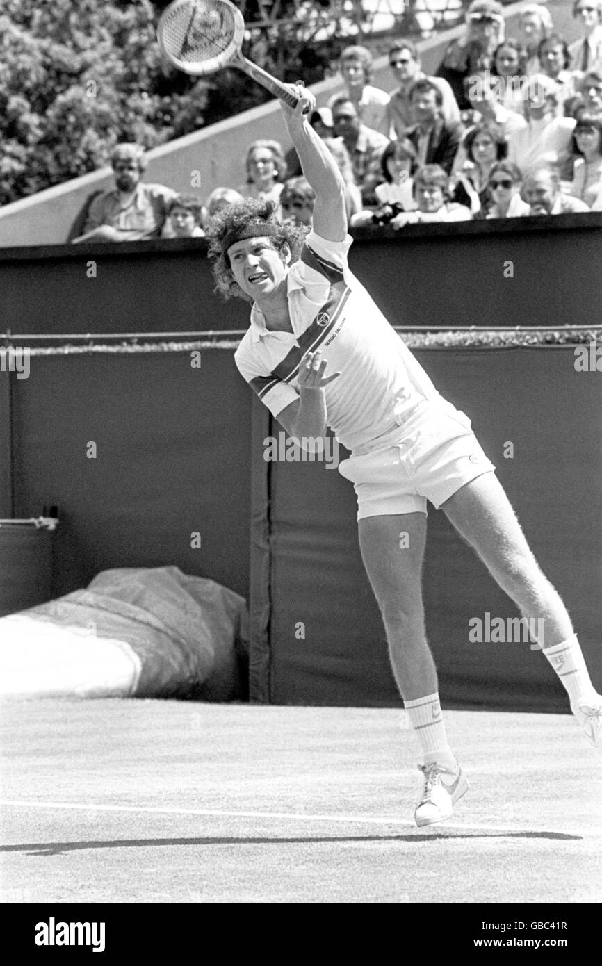 Tennis - Stella Artois Tournament - Queen's Club. John McEnroe serving Stock Photo
