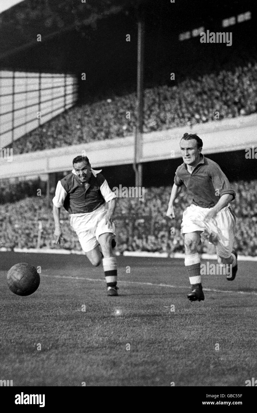 Soccer - Football League Division One - Arsenal v Everton. Everton's Tommy Eglington (r) gets away from Arsenal's Laurie Scott (l) Stock Photo