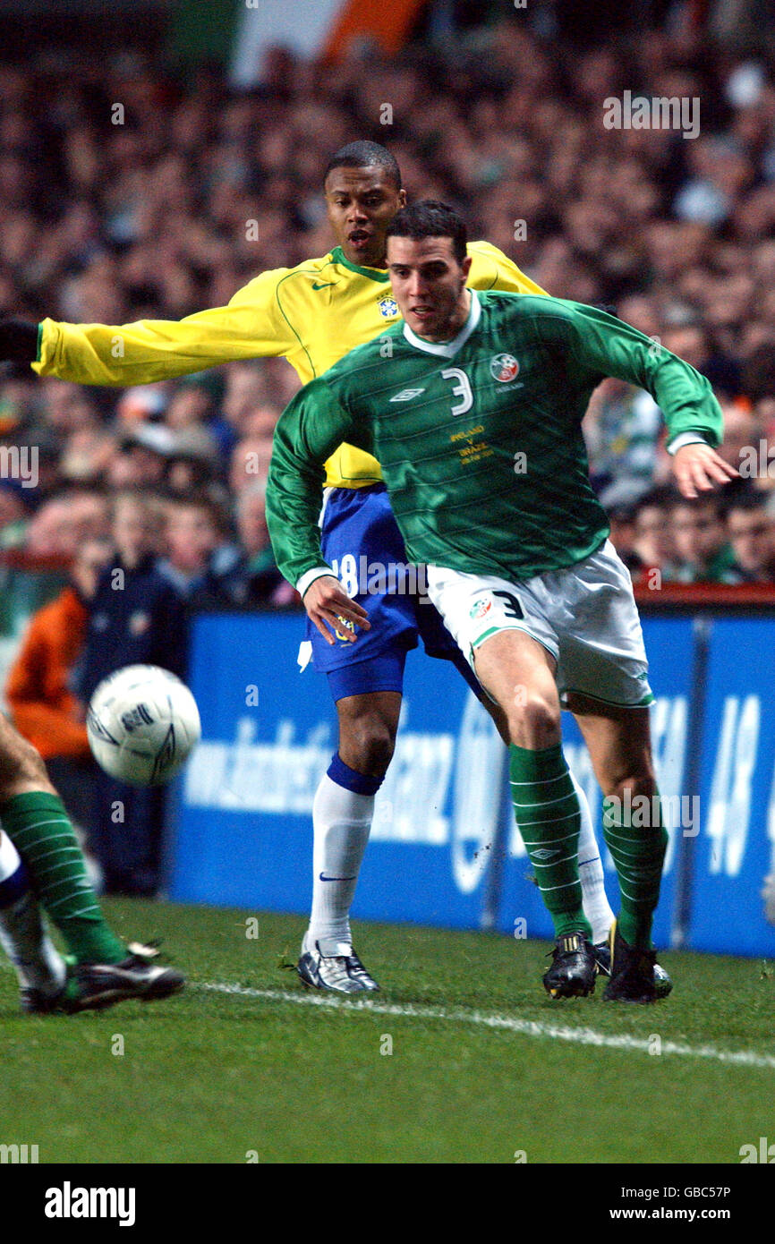 Soccer - International Friendly - Ireland v Brazil. Ireland's John O'Shea (r) shields the ball from Brazil's Julio Baptista Stock Photo