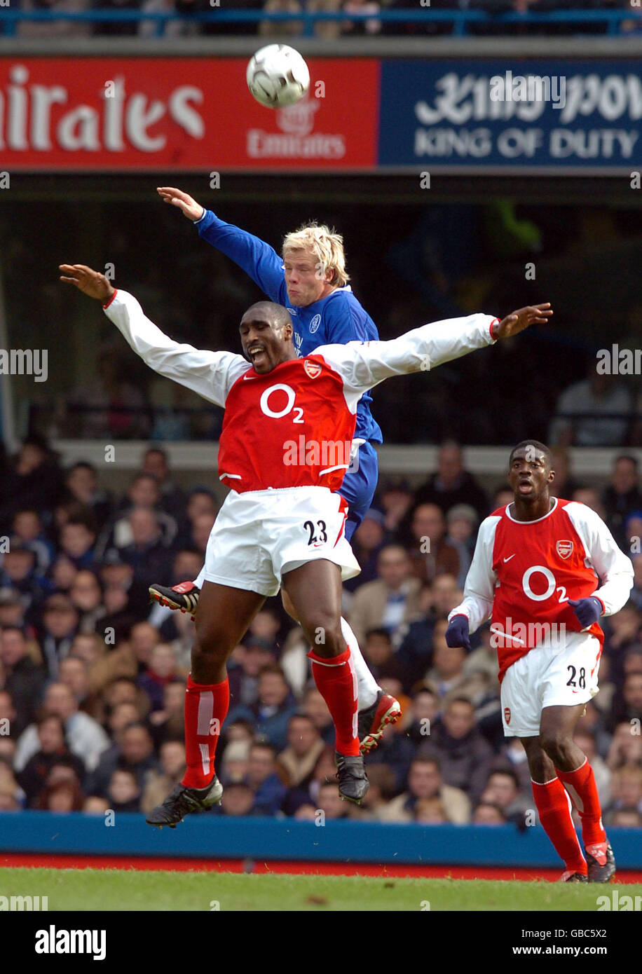 Chelsea's Eidur Gudjohnsen tries to get in a header behind Arsenal's
