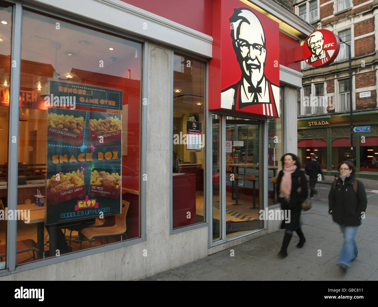 General view of a branch of Kentucky Fried Chicken, or KFC, on Clapham High Street, Clapham, south west London. Stock Photo