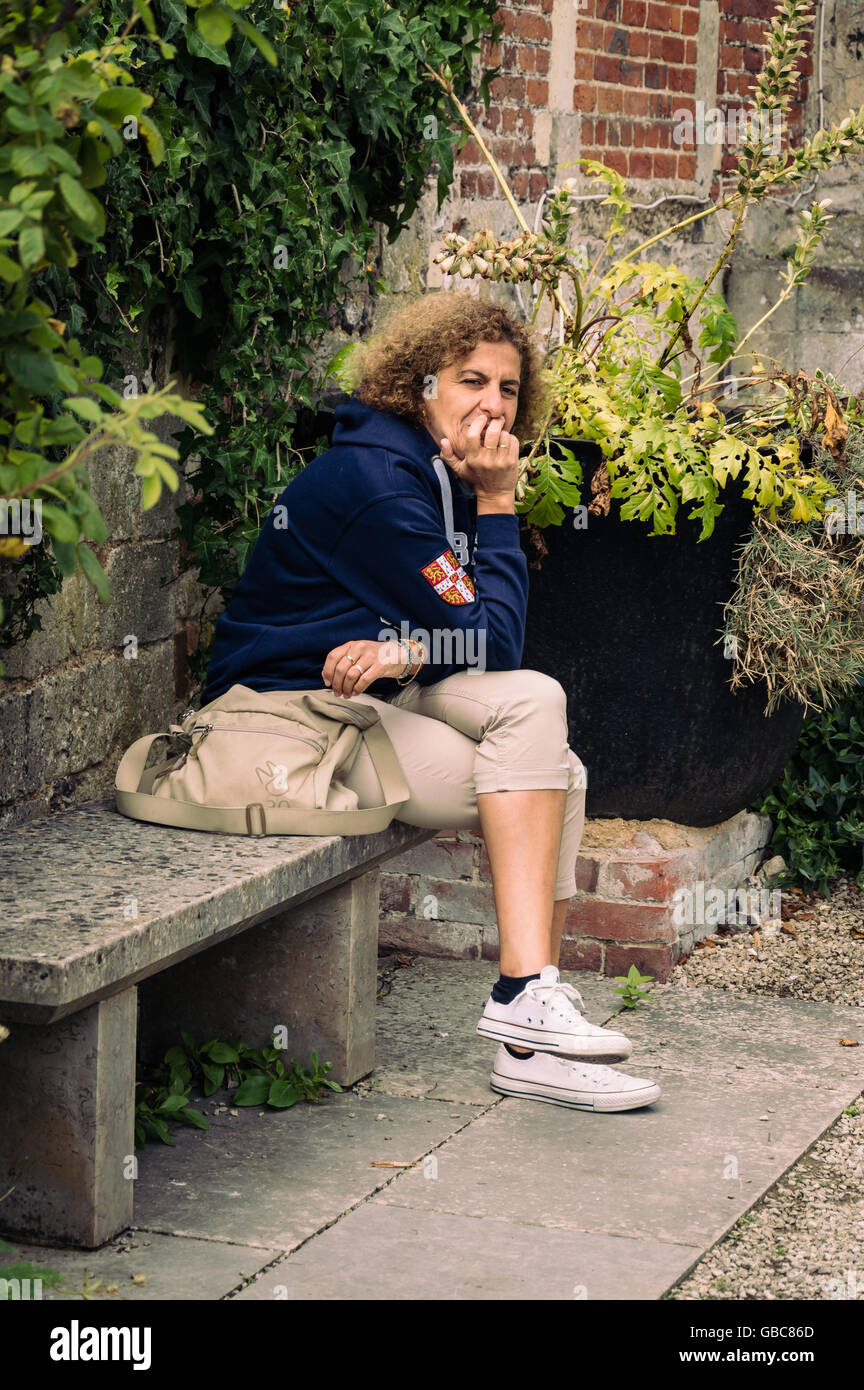 Woman sit relax outdoor thoughtful hi-res stock photography and images ...