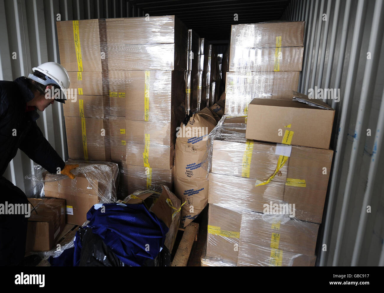 Clothes sent from Iceland are unloaded at Hull Docks today. Thousands of warm garments, that have been donated by people in Iceland, were collected by Age Concern. Stock Photo