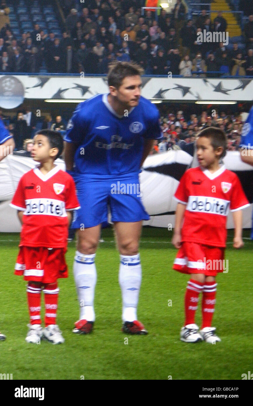 Soccer - UEFA Champions League - Second Round - Second Leg - Chelsea v VFB Stuttgart. Two players escorts line up with Chelsea's Frank Lampard before the match Stock Photo