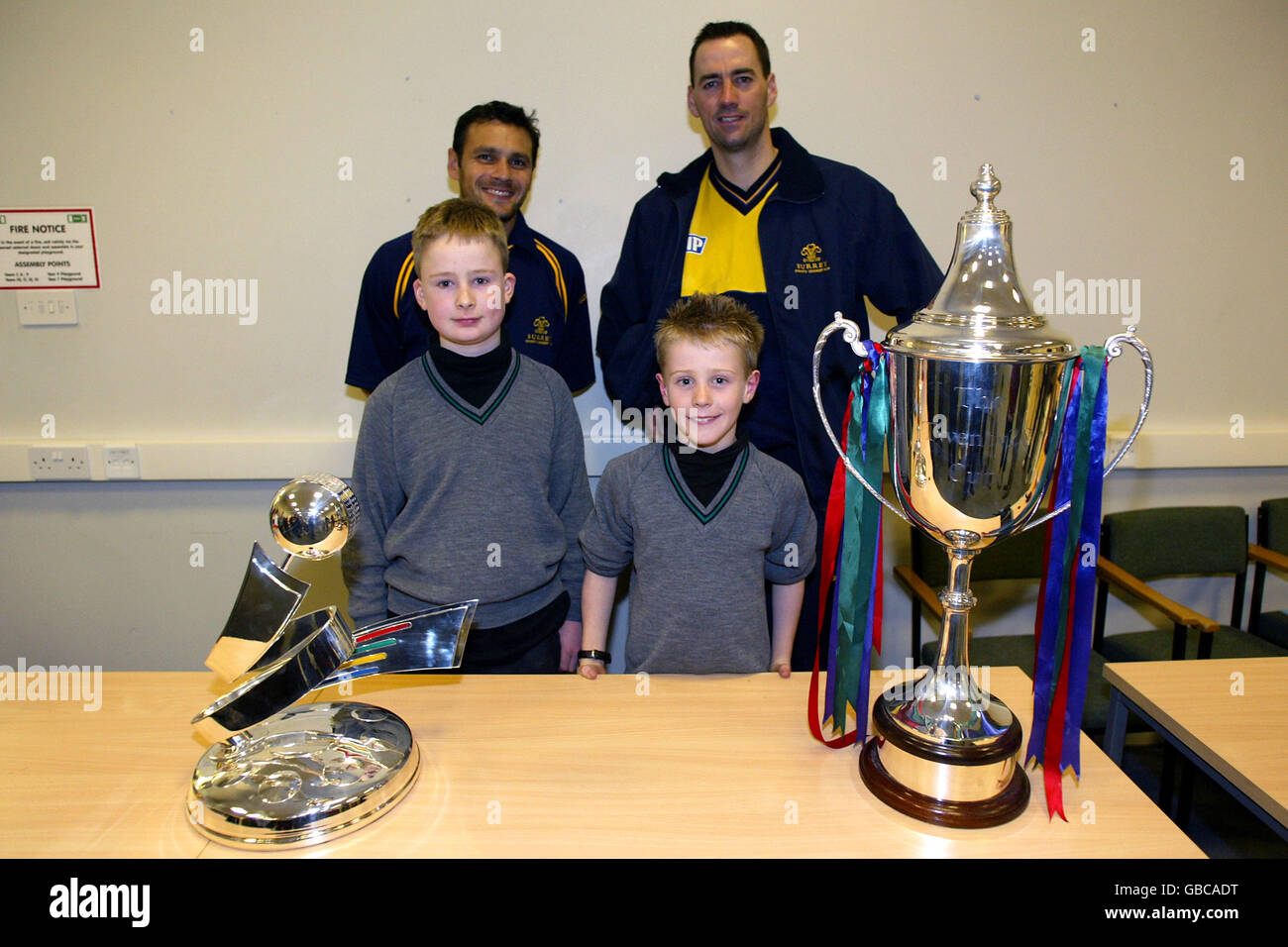 Surrey's Mark Ramprakash (l) and Martin Bicknell with young Surrey fans