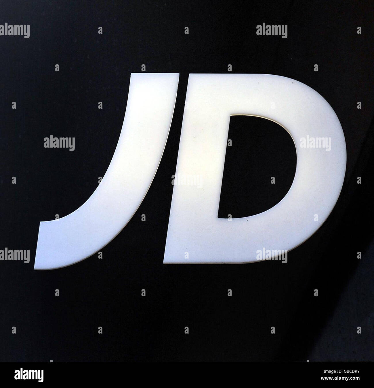 The logo outside the JD Sports shop on Oxford Street, central London. The sportswear chain bucked the Christmas retail gloom with a forecast of better-than-expected profits this year. Stock Photo