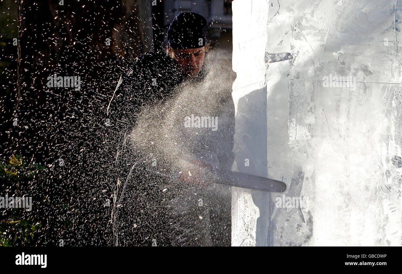 French Ice Sculptor Bruno Fleurit works on an ice sculpture ahead of London's first ever Ice Sculpting Festival, held at the Natural History Museum, Kensington, London. Stock Photo