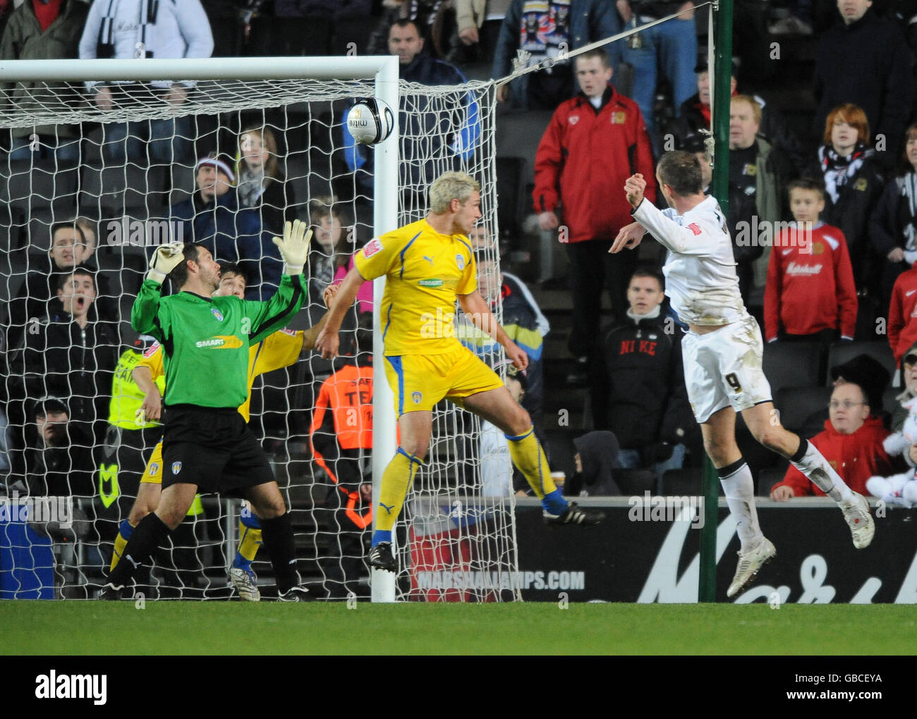 Milton Keynes Dons' Aaron Wilbraham scores their equalising goal against Colchester United Stock Photo