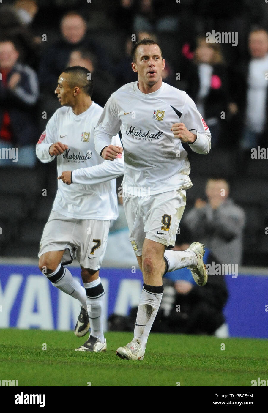 Milton Keynes Dons' and Aaron Wilbraham celebrates scoring against Colchester United Stock Photo