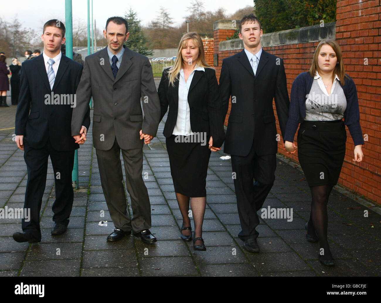 Sam Eastwell (second right) leaves Canterbury Crown Court in Kent with his brother Daryl (left), father Stuart (second left), mother Sharon (centre) and girlfriend Louise Sweeney (right) after the sentencing at Canterbury Crown Court in Kent of his attackers Aidan Shepherd and Grant Vanscolina. Stock Photo
